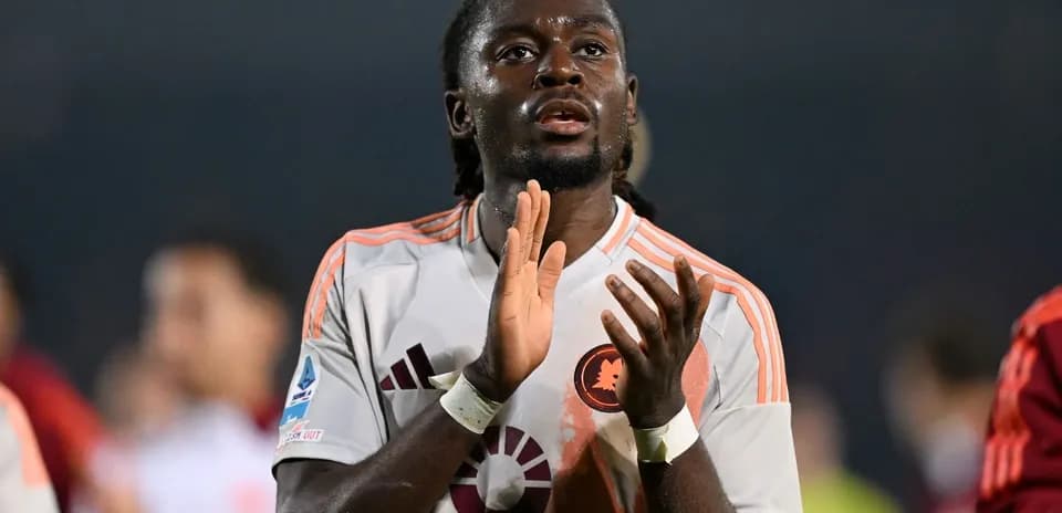 Player applauding fans after the match