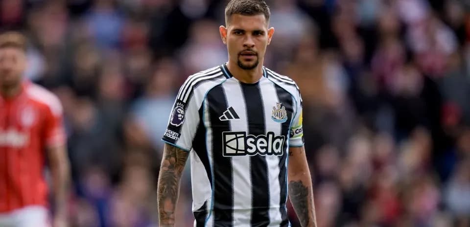 Newcastle player in striped jersey during match
