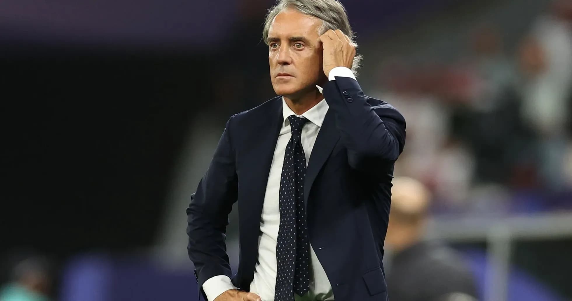 Manager observing the match from the sidelines