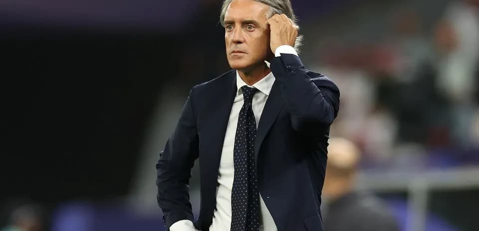 Manager observing the match from the sidelines