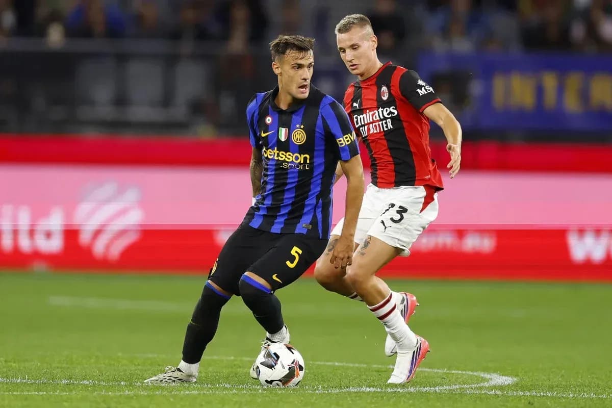 Two players contesting the ball during a match