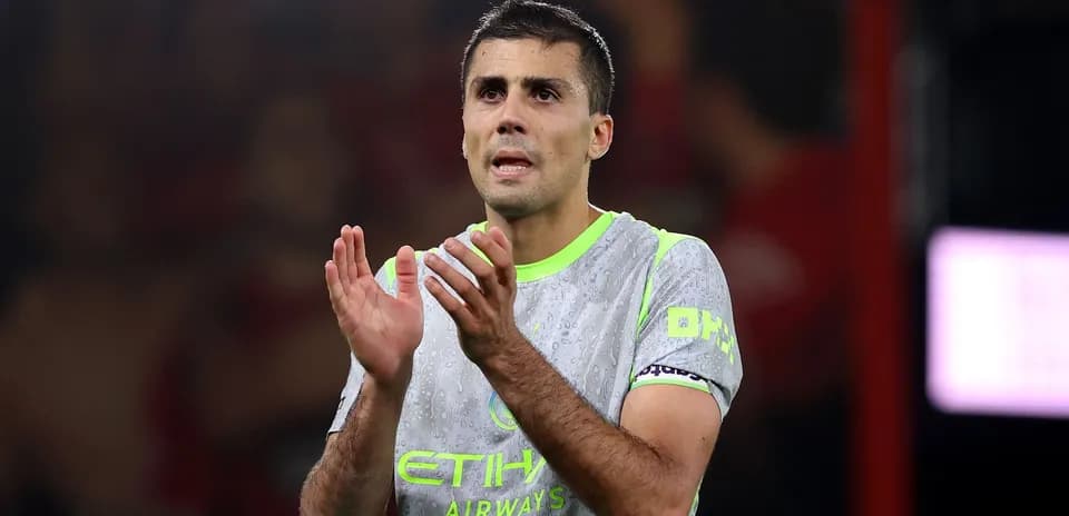 Player applauding fans during match at stadium