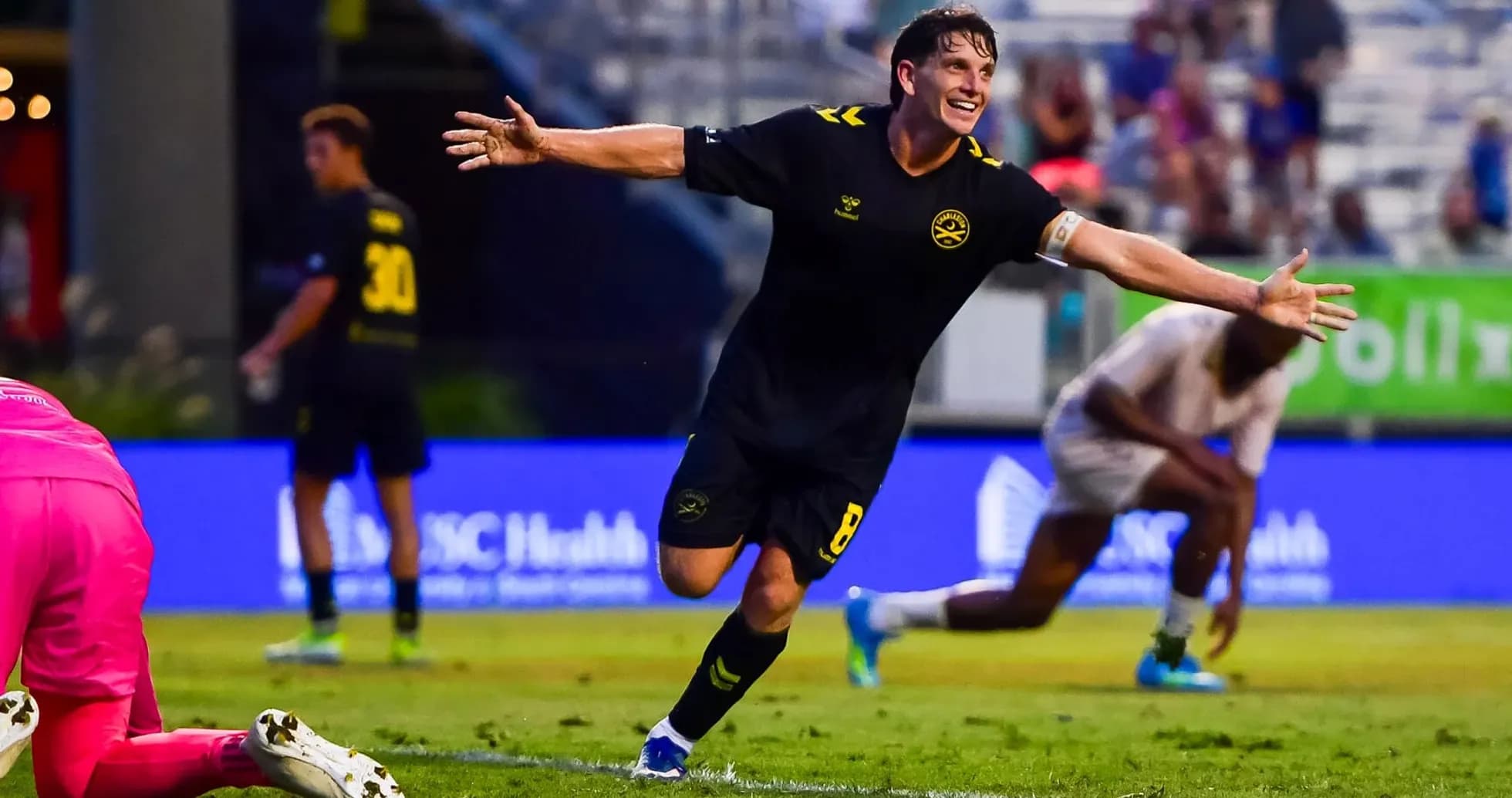 Charleston Battery player celebrating a goal