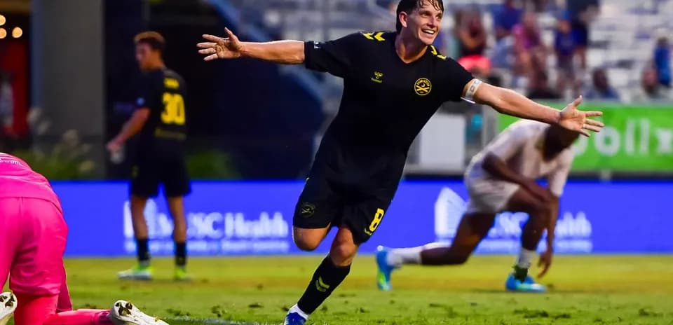 Charleston Battery player celebrating a goal