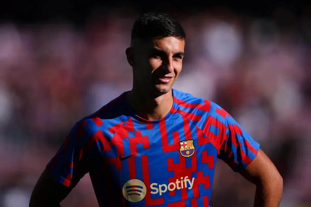 Player in Barcelona jersey smiling during event