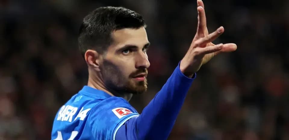 Player gesturing during a match in blue kit