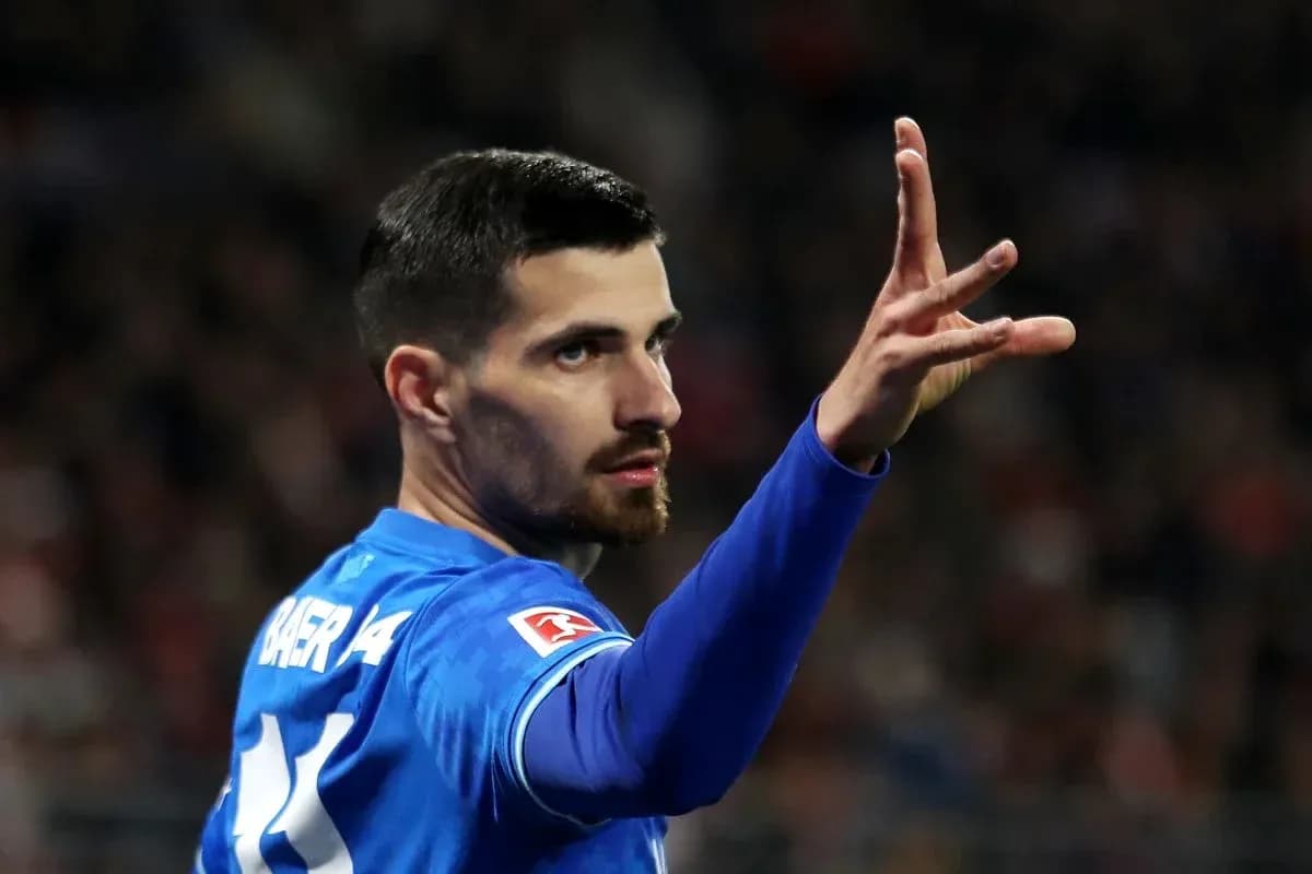 Player gesturing during a match in blue kit