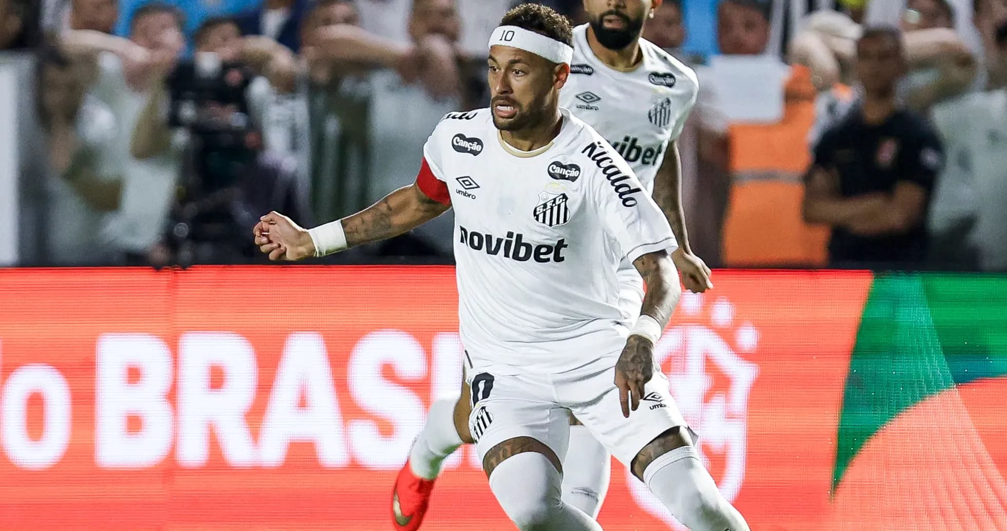 Neymar celebrating a goal for Santos FC during match