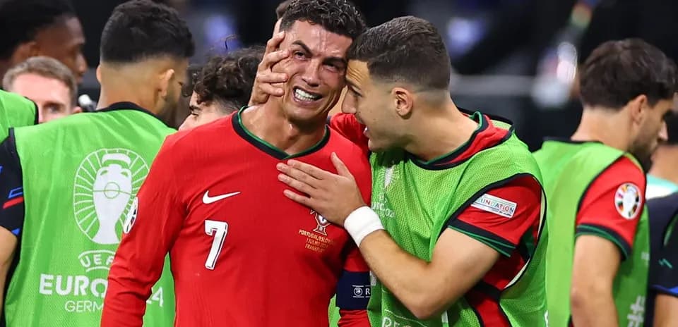 Cristiano Ronaldo with teammate after a match
