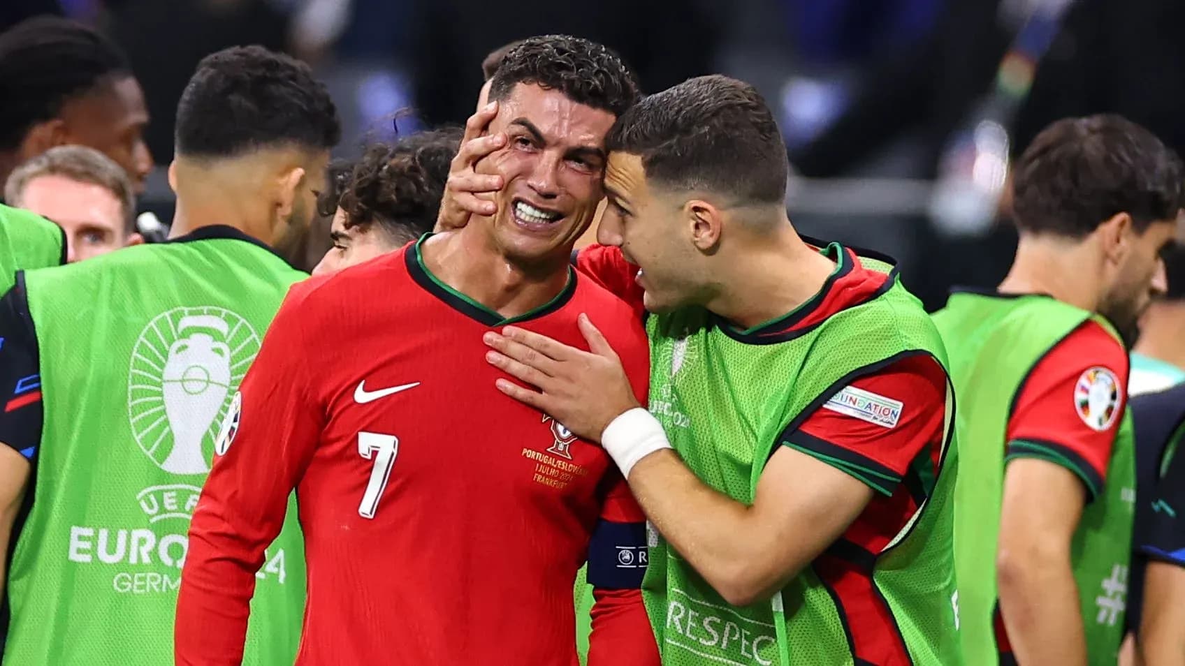Cristiano Ronaldo with teammate after a match