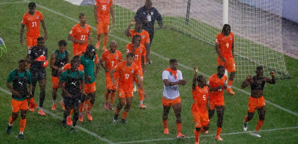 Ivory Coast players celebrating on the pitch