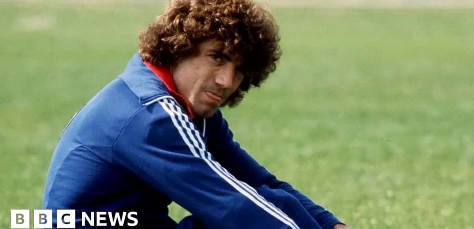 Player sitting on grass during training session