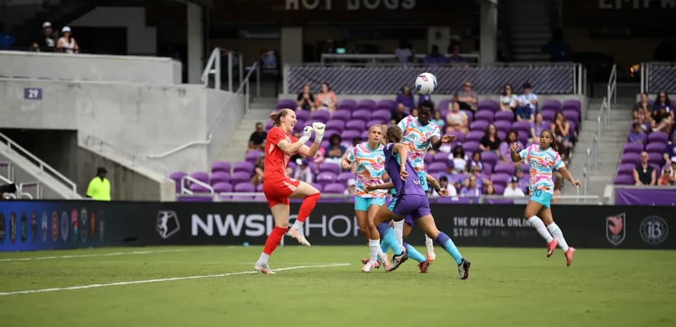 Goalkeeper celebrating during NWSL match action