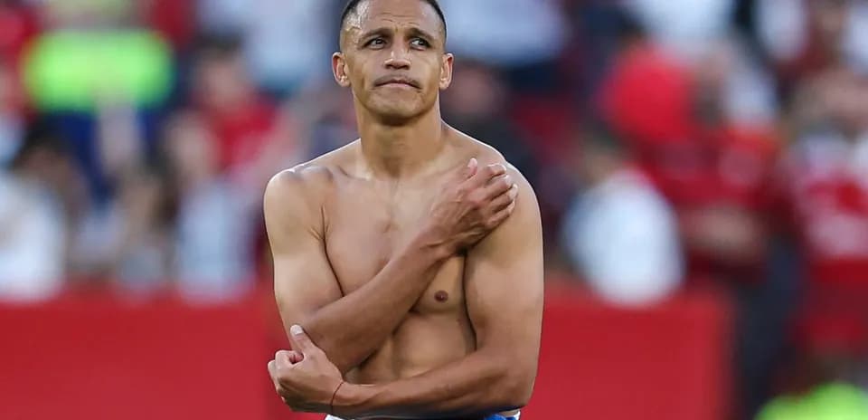 Player with no shirt standing on the pitch