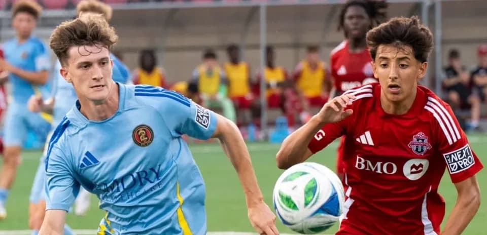 Atlanta United II player challenging Toronto II player