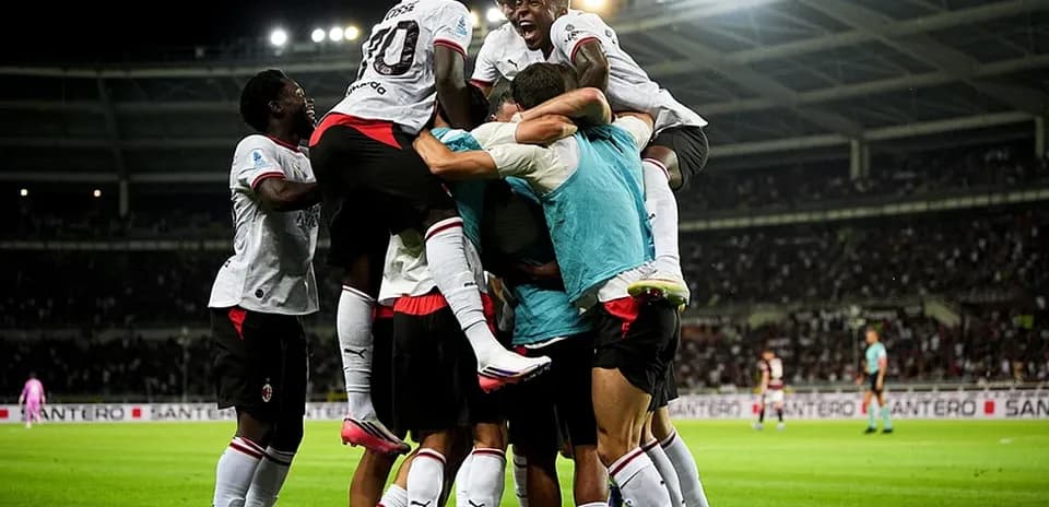 AC Milan players celebrating a goal