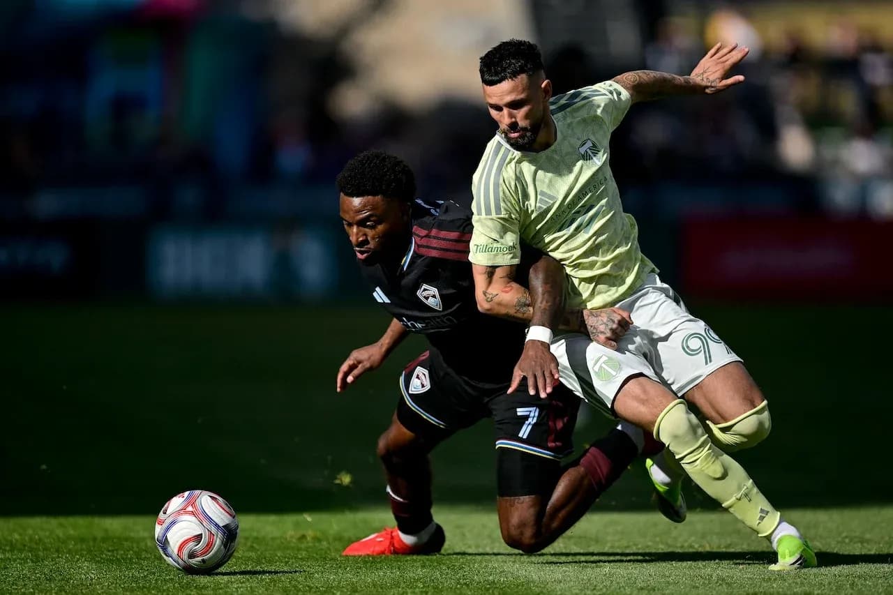 Players contesting for the ball in match