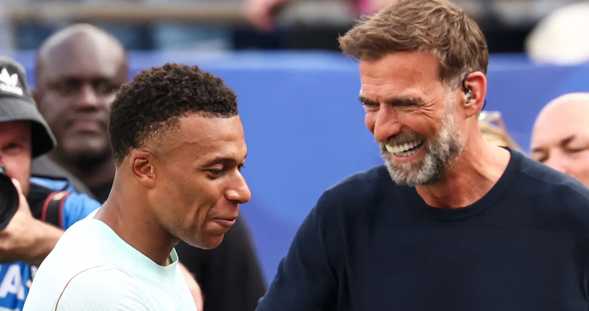 Kylian Mbappé and Jurgen Klopp sharing a moment