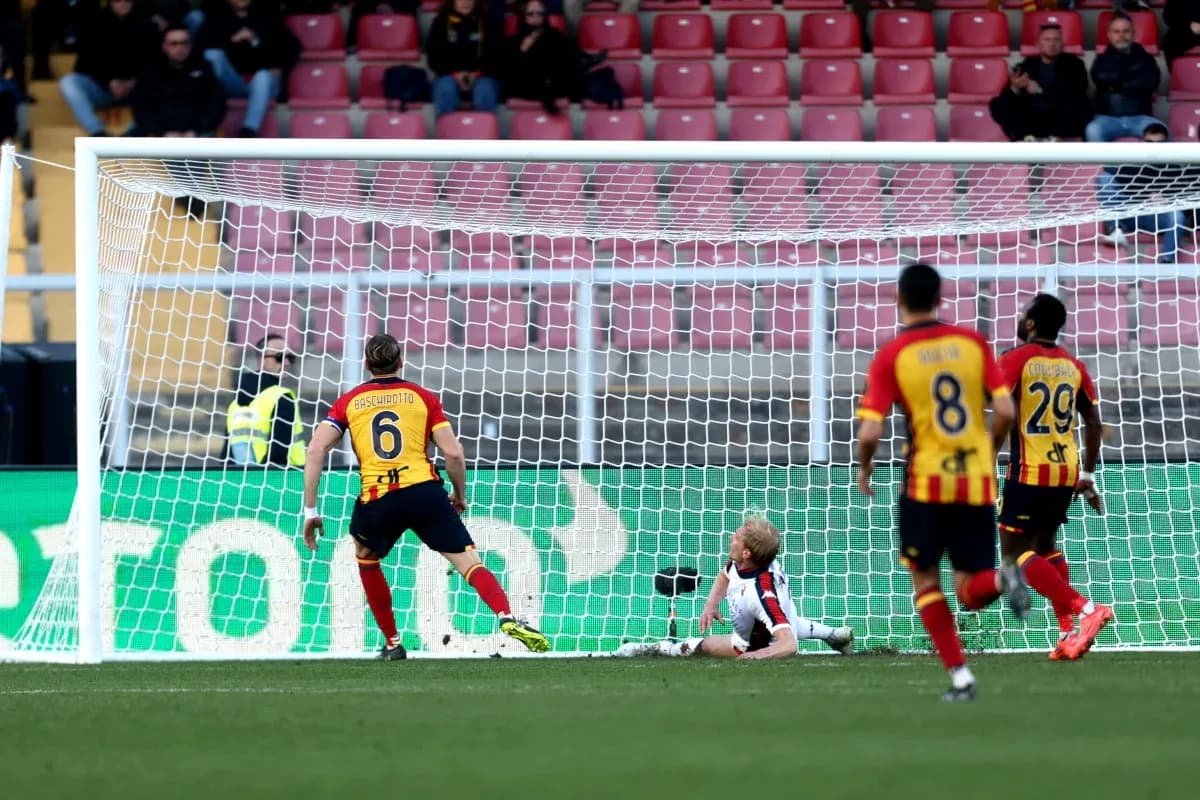 Lecce player scoring a goal against Genoa