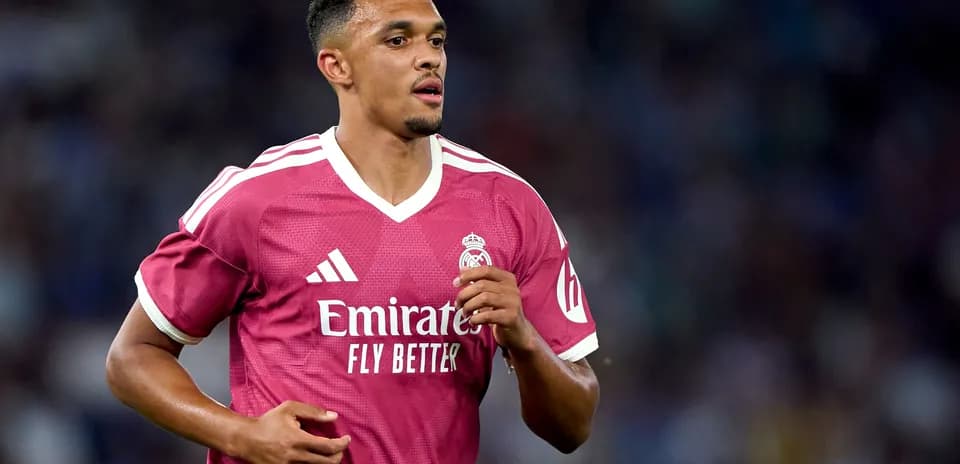 Player in pink Real Madrid jersey during match