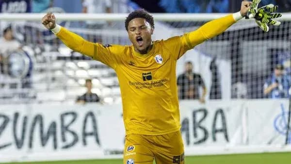 Goalkeeper celebrating a victory on the field