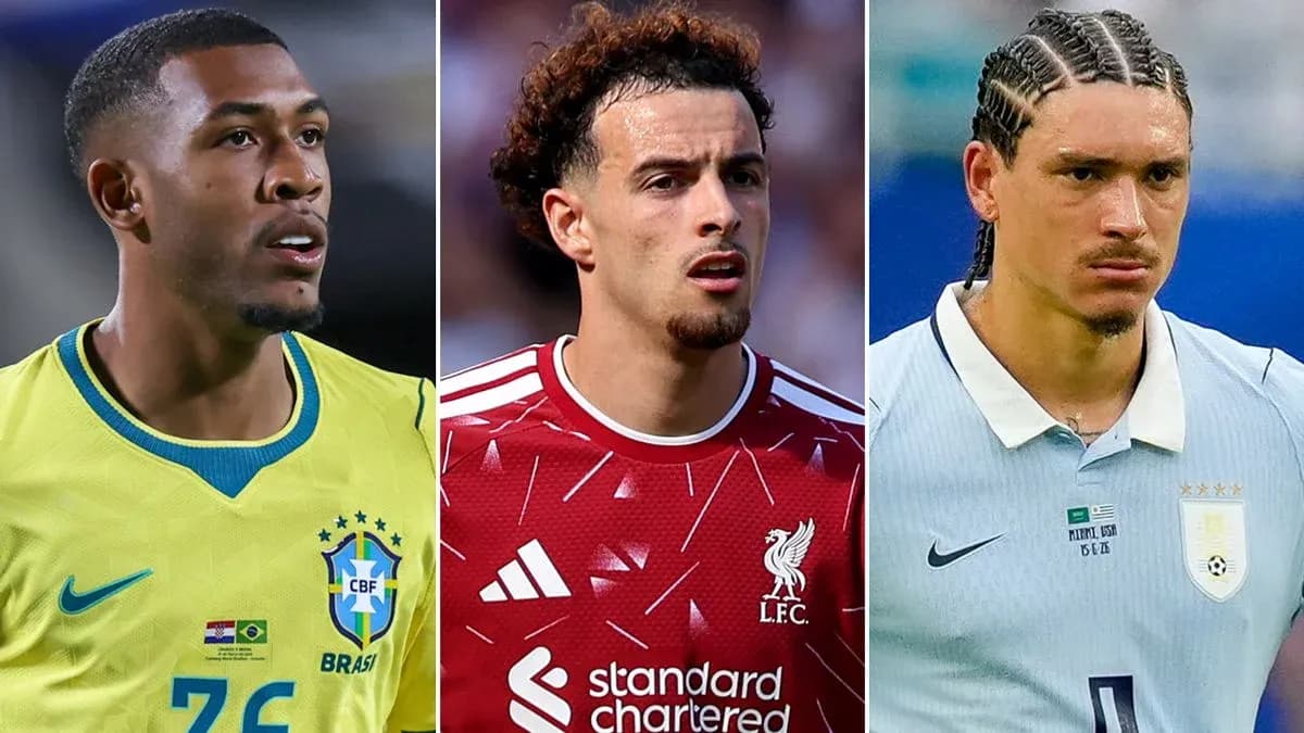 Three football players in national team jerseys