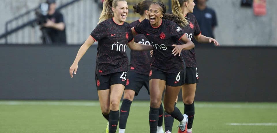 Portland Thorns players celebrating a goal