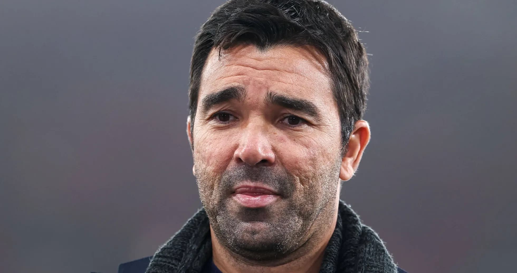 Close-up of a man with short dark hair