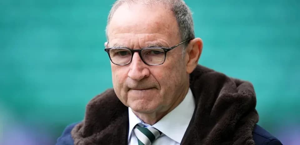 Man in glasses wearing a jacket with hood