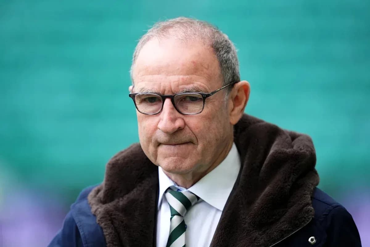 Man in glasses wearing a jacket with hood