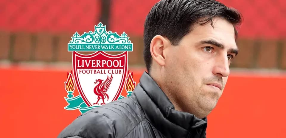 Man in jacket with Liverpool FC logo background