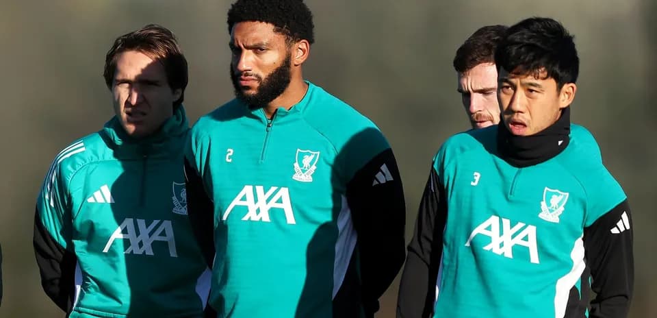 Four players in Liverpool training gear during session