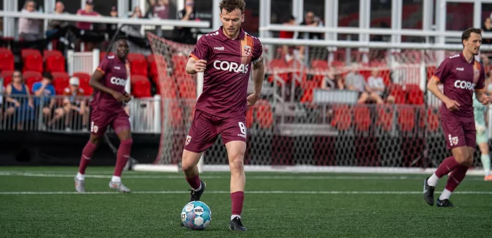 Player dribbling ball during Birmingham Legion match