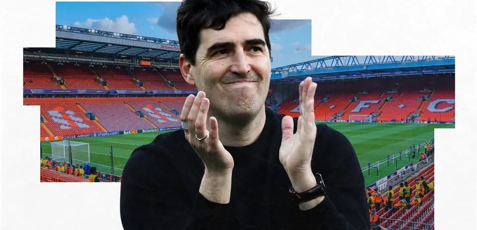 Man clapping in front of empty football stadium