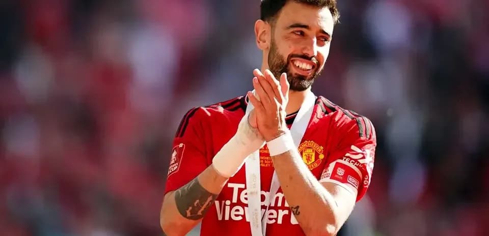 Bruno Fernandes celebrating with medal after match