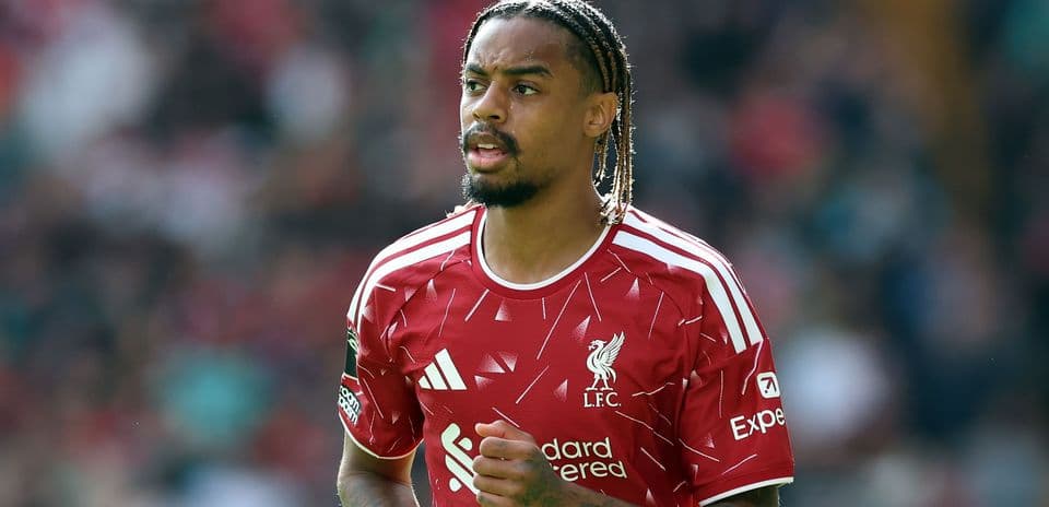 Player in Liverpool kit during match action