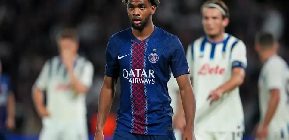 Player in PSG kit walking on the pitch during match