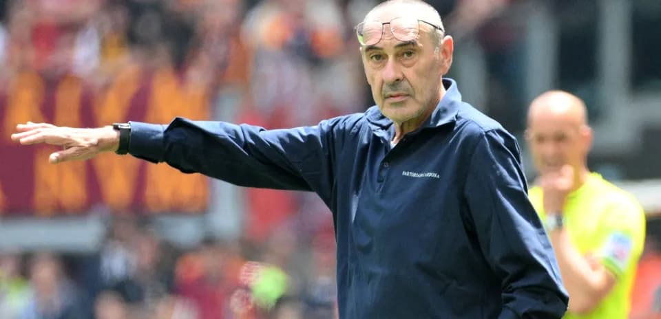 Coach gesturing during a match on the sidelines