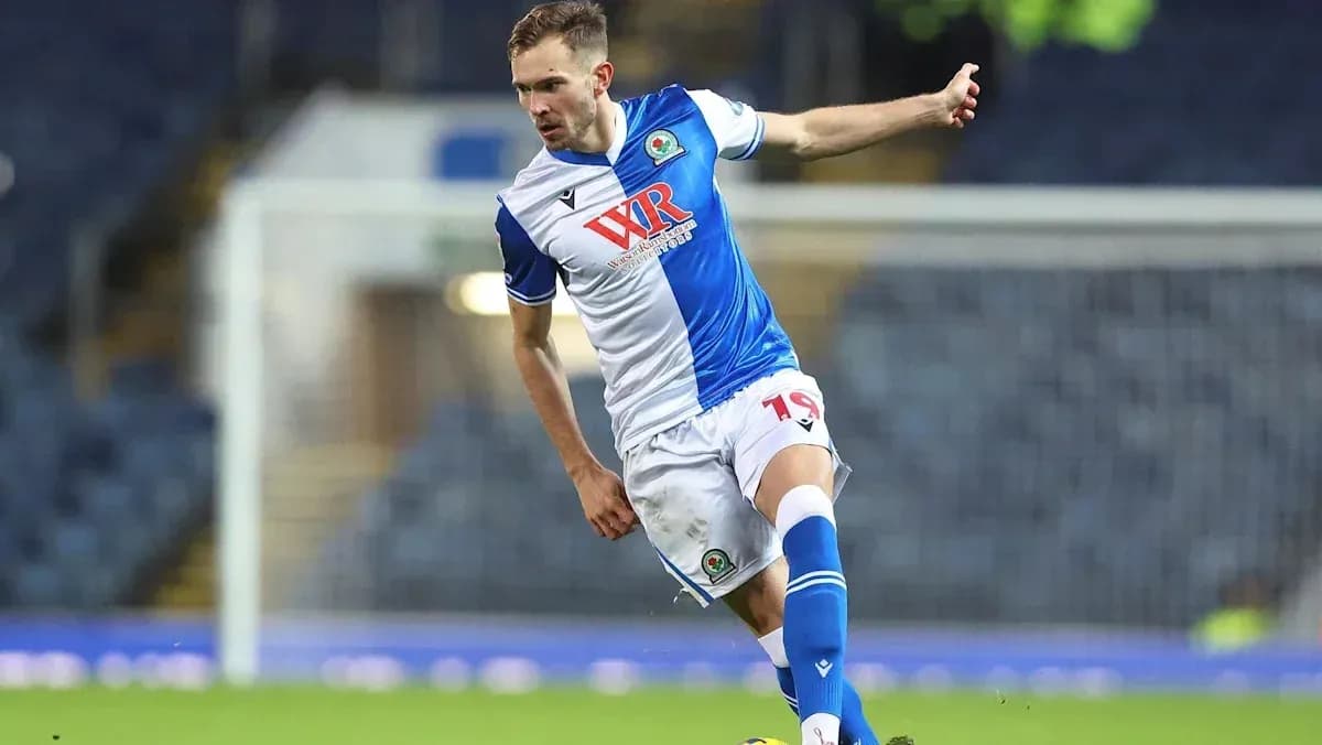 Player kicking the ball during a football match