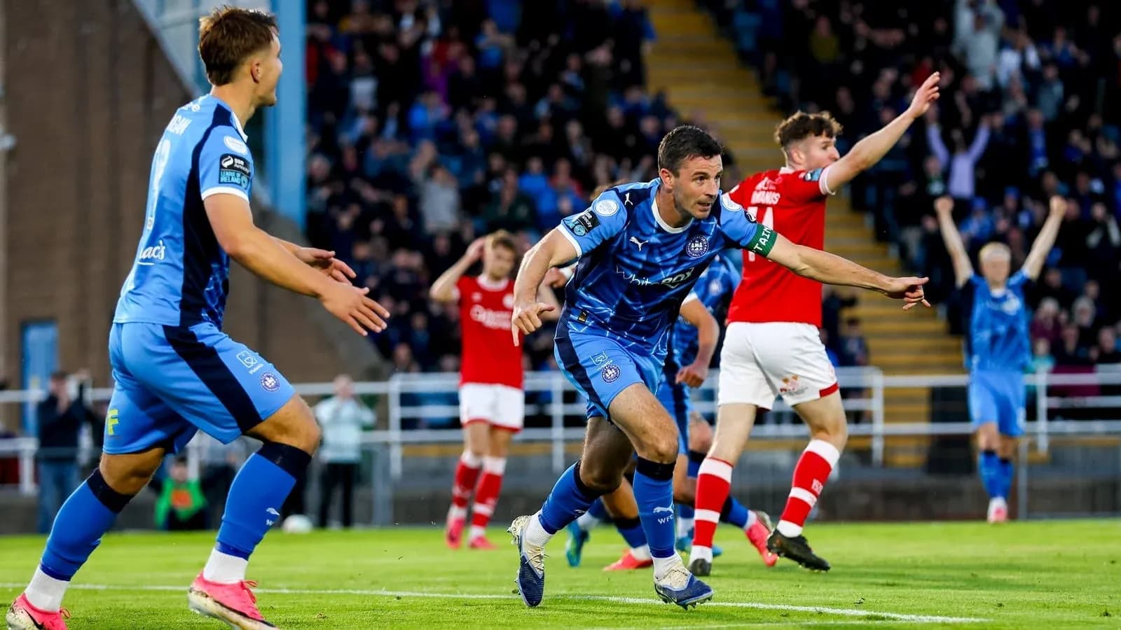 Player celebrating a goal during a football match