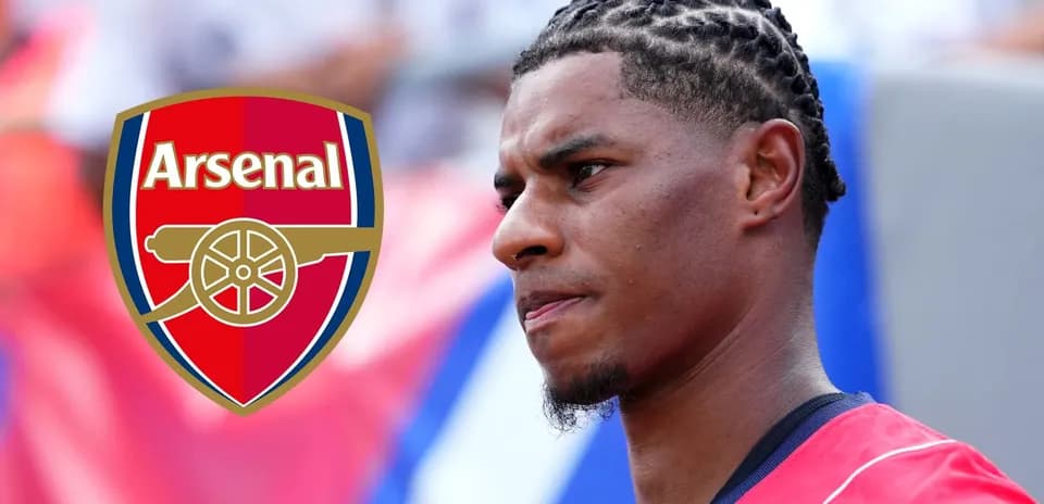 Player in Arsenal jersey with braided hair