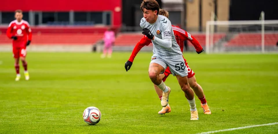 Player dribbling the ball during match