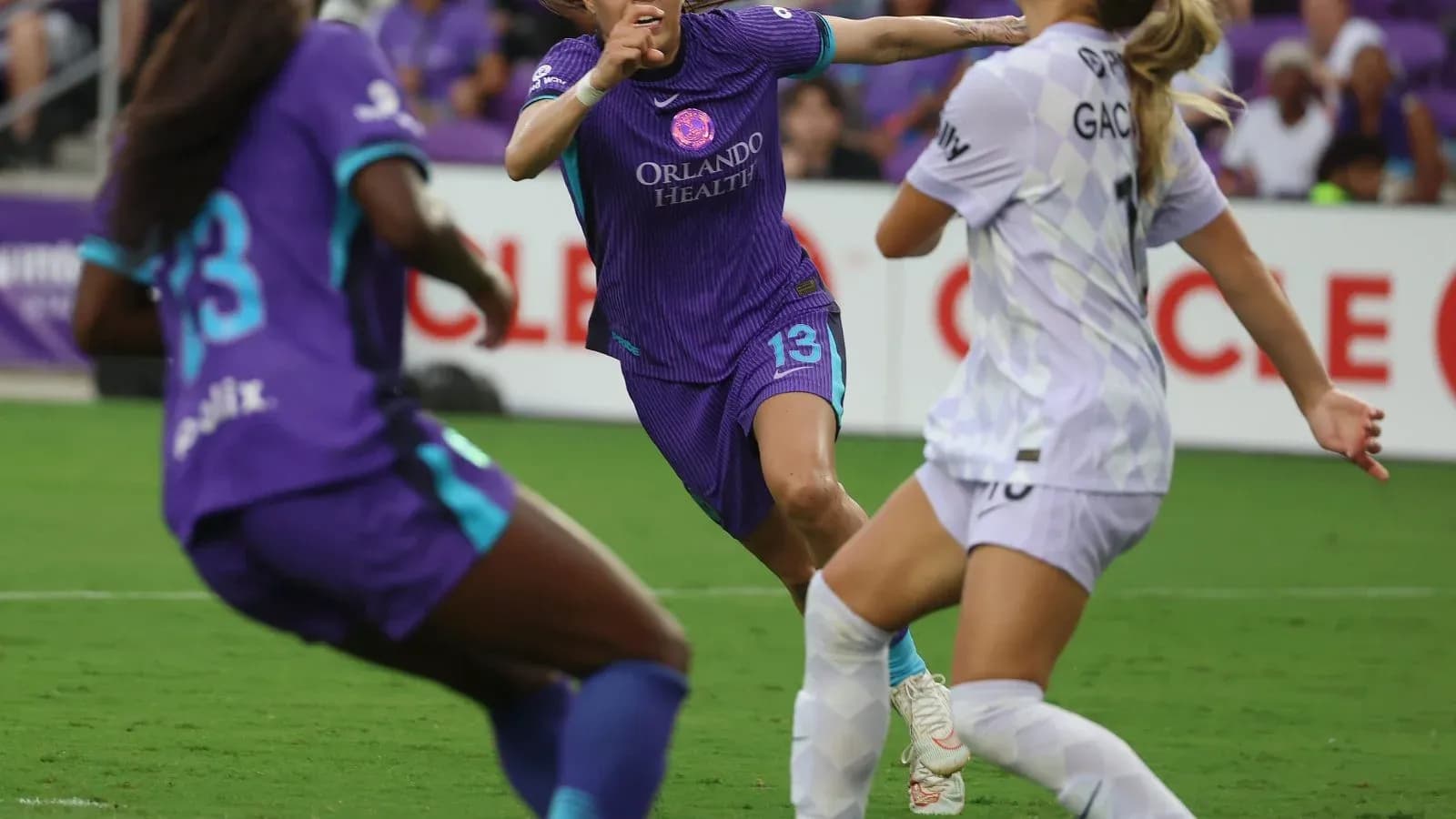 Orlando Pride player in action against Portland Thorns