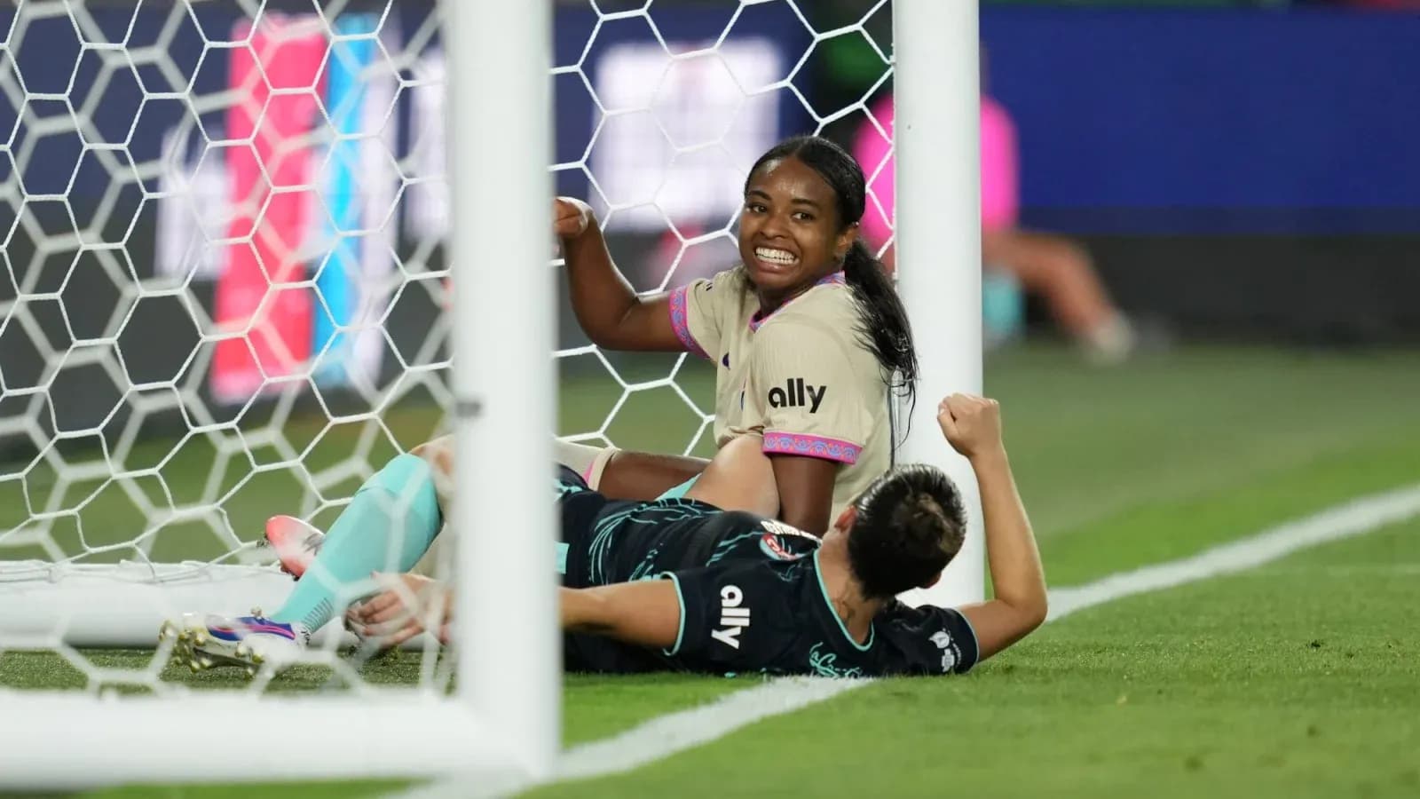 San Diego Wave player celebrating near goal