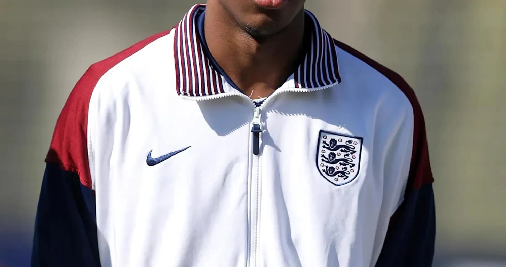 Player wearing England training jacket outdoors