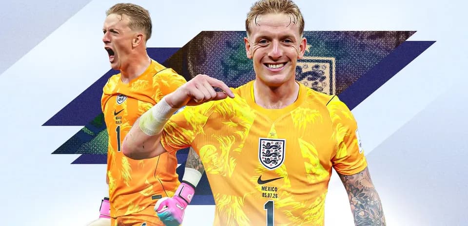 Goalkeeper celebrating in England's vibrant kit