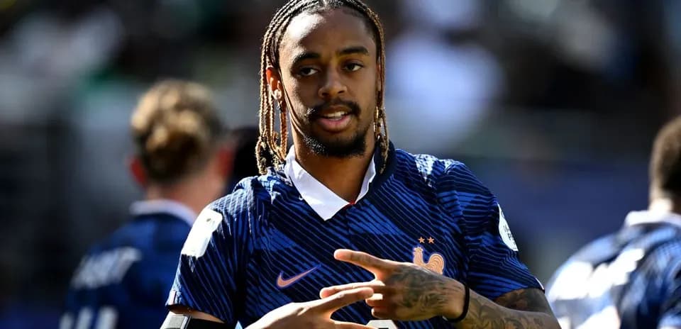 Player in France kit posing during warm-up