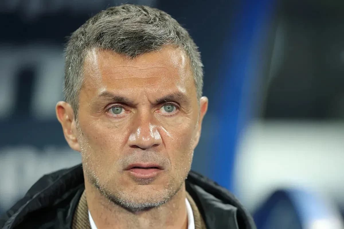 Coach focused during a match on the sidelines
