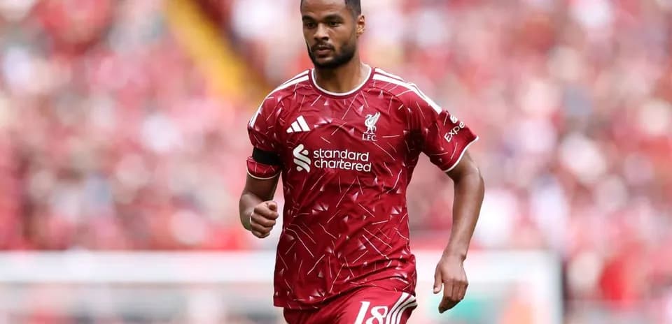 Player in red Liverpool kit during match