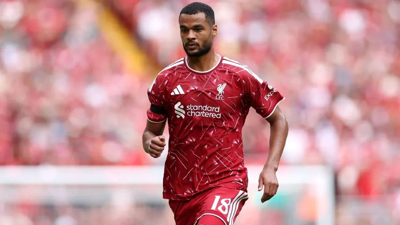 Player in red Liverpool kit during match